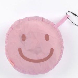 Pink Smile Raincoat in a bag poncho NWT